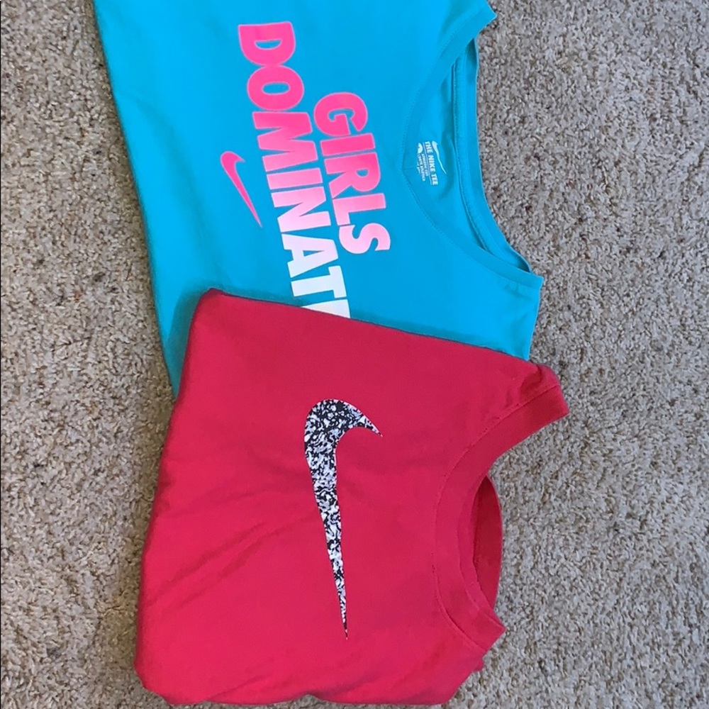 Nike blue shirt (size LG) Nike red shirt (size M)